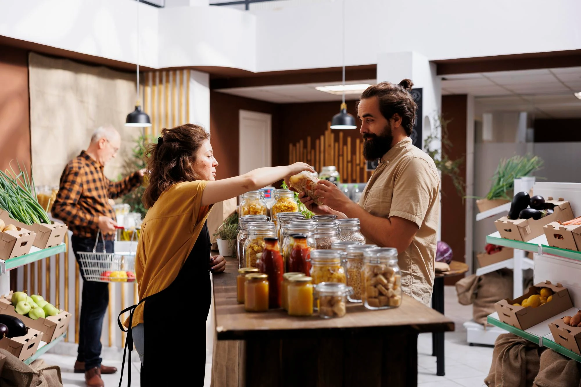 Choosing cheese in a Paris gourmet food store